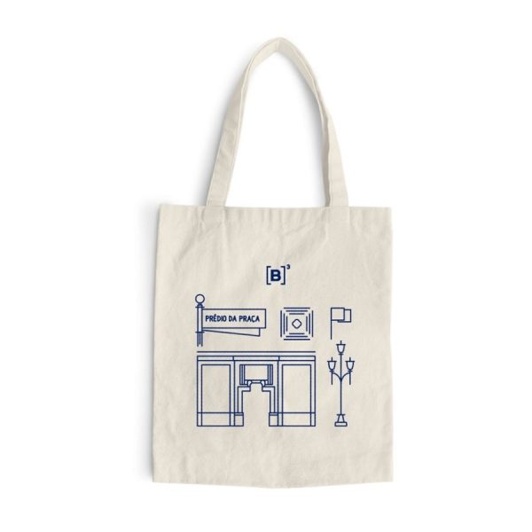 Ecobag de material sustentável, estampa frontal em azul marinho de logo B3 e ícones desenhados a partir de elementos retirados da arquitetura do prédio Praça Antônio Prado.